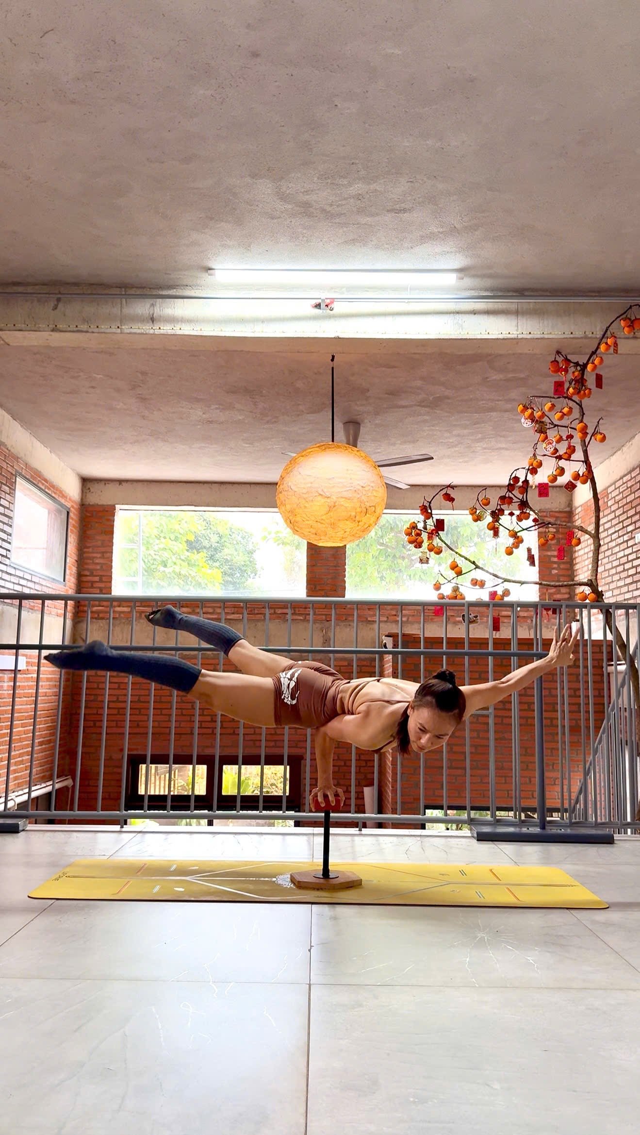 Handstand by infinity pool